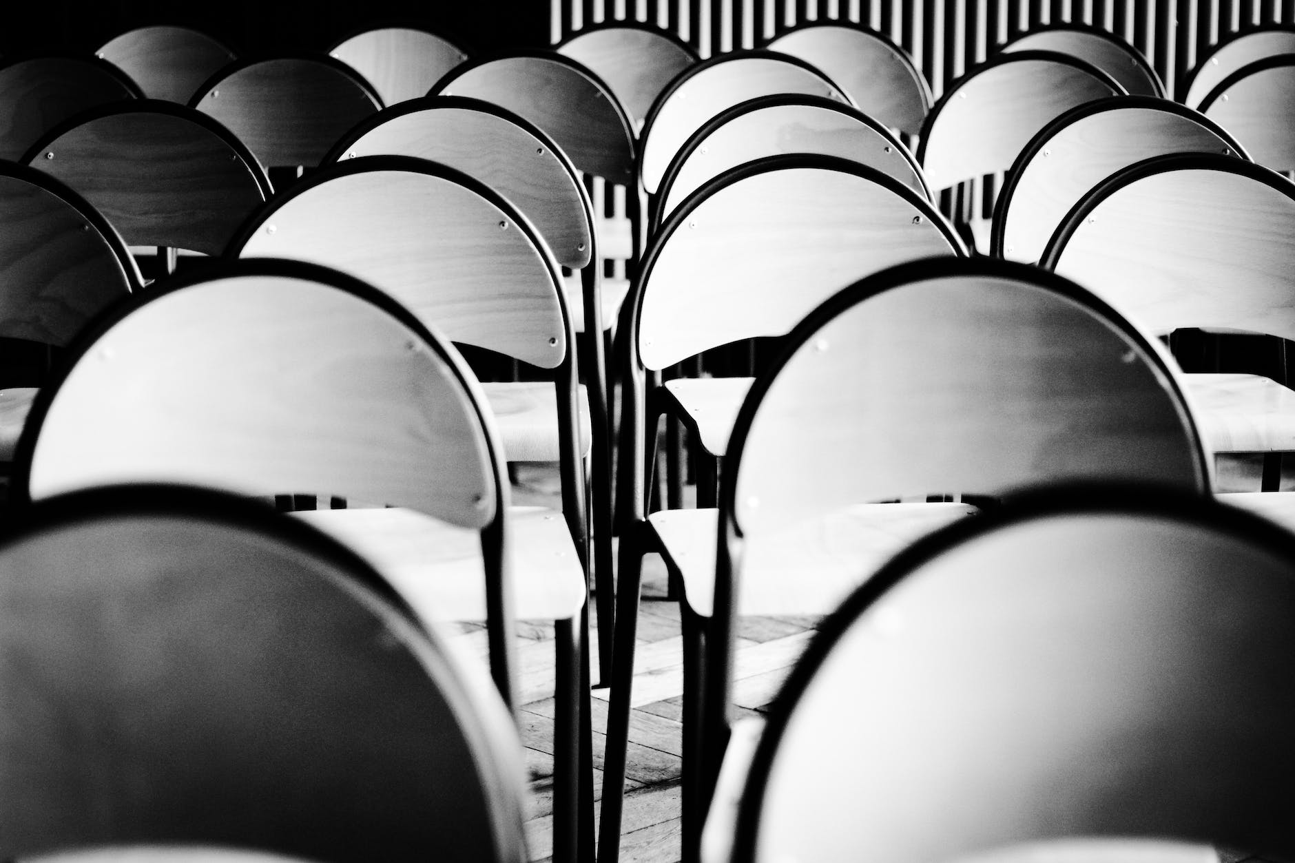 grayscale photo of armchairs