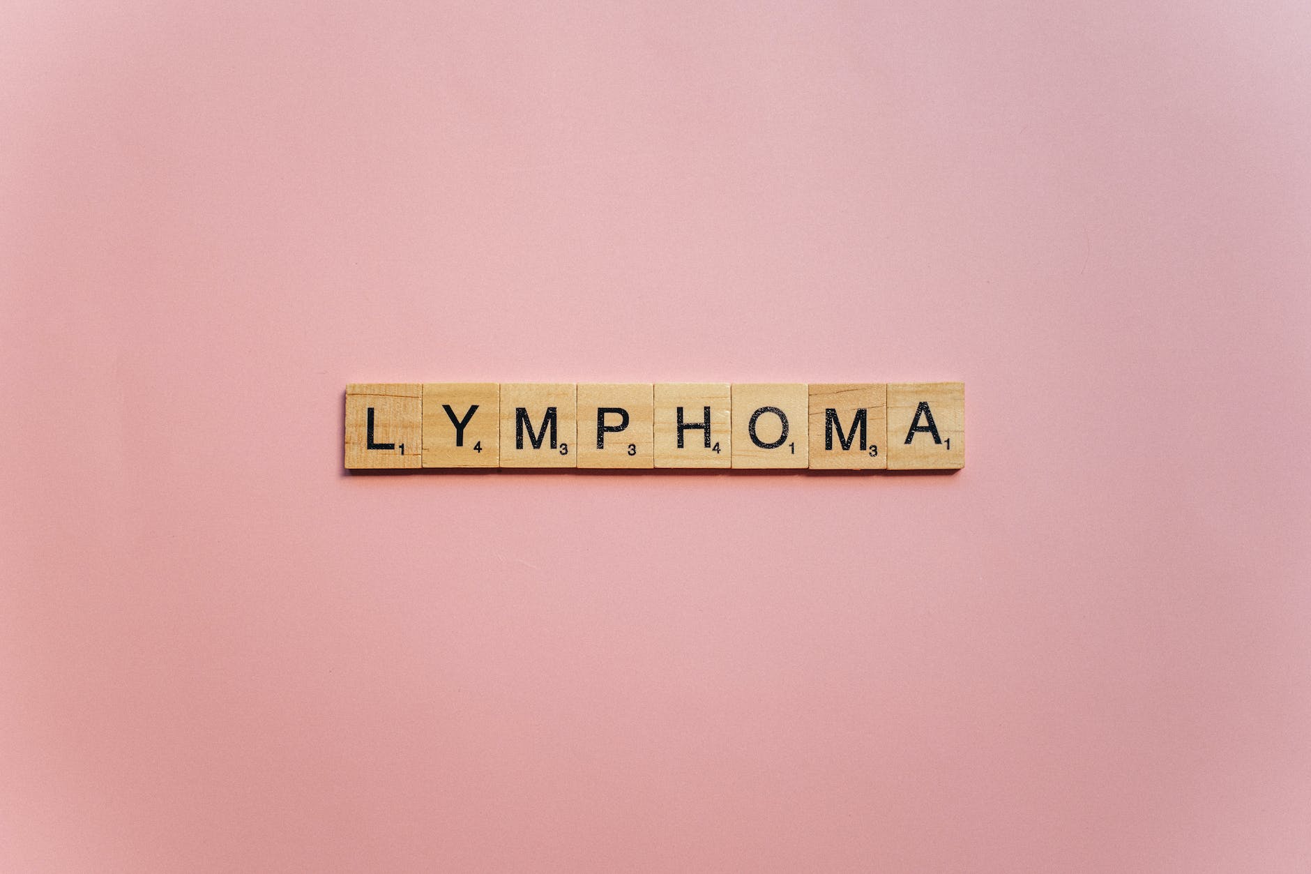 lymphoma spelled on wooden scrabble pieces